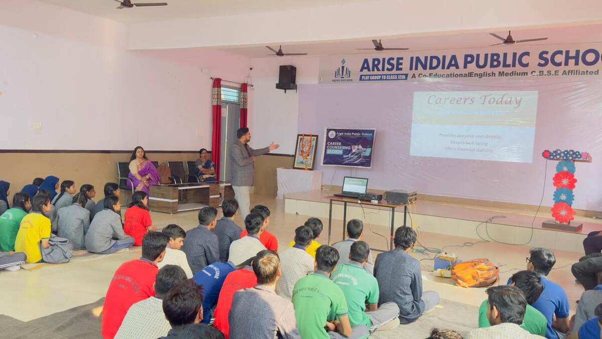 Students attending a career counselling session in the school hall